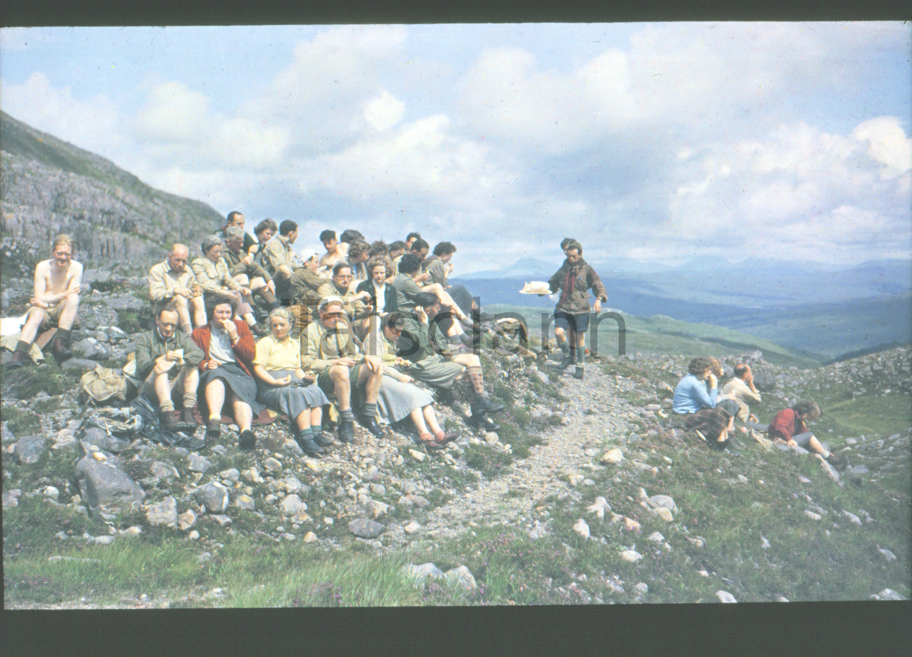 Lunch on the path from Achnashellach Forest to Kinlochewe in Scotland.