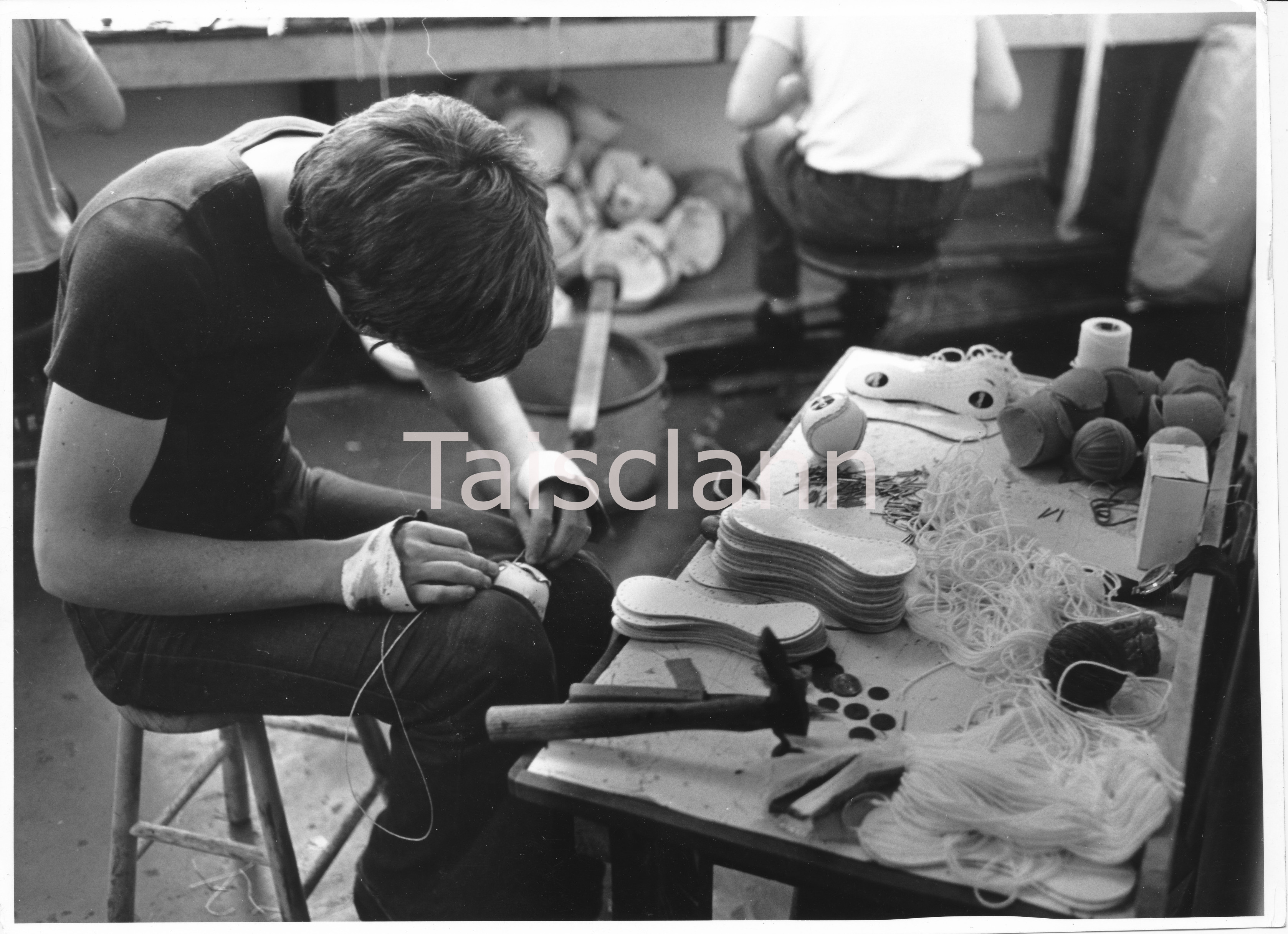 Hand stitching hurling balls at O'Neills in Dublin.