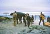 Men carrying a Curragh at Aran Island.