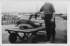 The Dolphin is loaded onto a trailer.