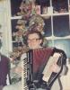 Playing the accordion.