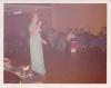 Singing at the party.