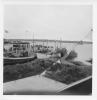 Boats and a large crowd at the Burtonport Quayside.