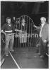 John Brennan (centre) a well known blacksmith in Kilkenny with a solid iron gate he has just made.