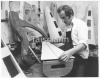 Charles Jordan, 20 years a harp maker at work in the workshop of Waltons of Dublin.