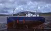 Dingle - Men Painting a Fishing Boat